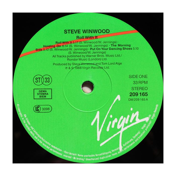 Steve Winwood - Roll With It