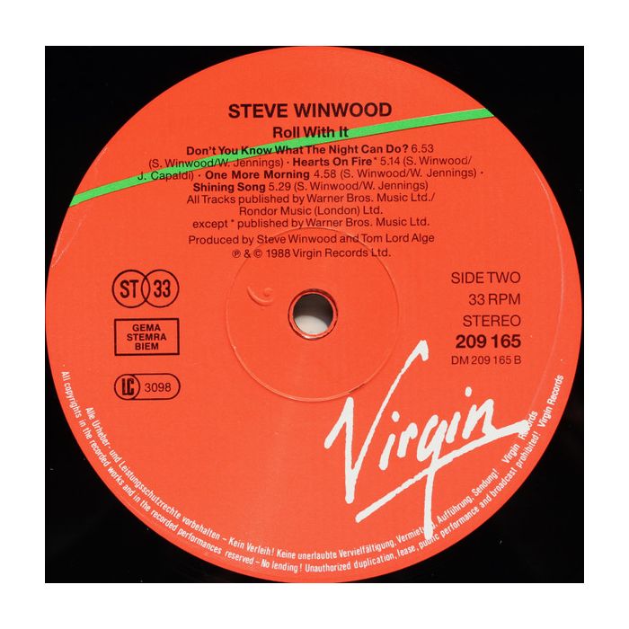 Steve Winwood - Roll With It